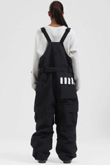 Peto para nieve holgado con múltiples bolsillos y cremalleras desmontables en color negro para mujer 