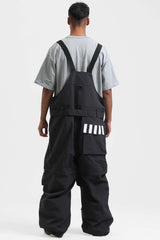Peto para nieve holgado con múltiples bolsillos y cremalleras desmontables en color negro para hombre