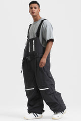 Peto para nieve holgado con múltiples bolsillos y cremalleras desmontables en color negro para hombre