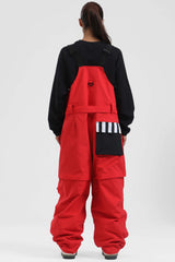 Peto para nieve holgado con múltiples bolsillos y cremalleras desmontables en color negro para mujer 