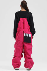 Peto para nieve holgado con múltiples bolsillos y cremalleras desmontables en color negro para mujer 