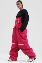 Peto para nieve holgado con múltiples bolsillos y cremalleras desmontables en color negro para mujer 
