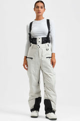 Pantalones de nieve holgados con aislamiento de color café para mujer con tirantes desmontables 