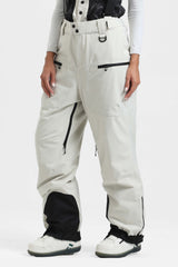 Pantalones de nieve holgados con aislamiento de color café para mujer con tirantes desmontables 