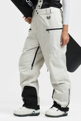 Pantalones de nieve holgados con aislamiento de color café para mujer con tirantes desmontables 