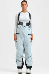 Pantalones de nieve holgados con aislamiento de color café para mujer con tirantes desmontables 