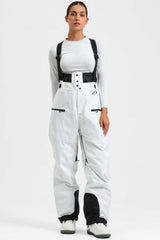 Pantalones de nieve holgados con aislamiento de color café para mujer con tirantes desmontables 