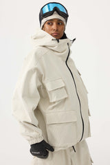 Chaqueta de nieve de pana impermeable con mangas de murciélago y bolsillo grande para mujer en color blanco roto