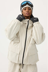 Chaqueta de nieve de pana impermeable con mangas de murciélago y bolsillo grande para mujer en color blanco roto