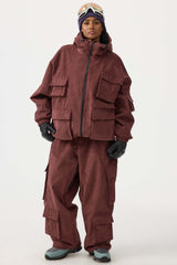 Chaqueta de nieve de pana impermeable de color caqui con mangas de murciélago y bolsillo grande para mujer