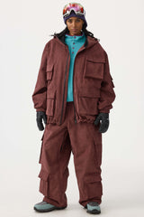 Chaqueta de nieve de pana impermeable de color rojo ladrillo con mangas de murciélago y bolsillo grande para mujer