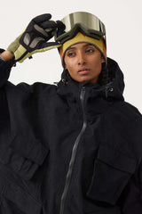 Chaqueta de nieve de pana impermeable de color rojo ladrillo con mangas de murciélago y bolsillo grande para mujer