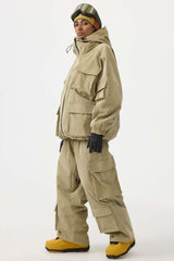 Chaqueta de nieve de pana impermeable con mangas de murciélago y bolsillo grande para mujer en color blanco roto