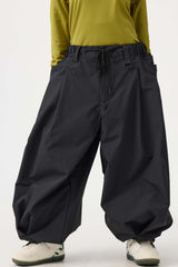 Pantalones de nieve holgados con cordón negro para mujer 