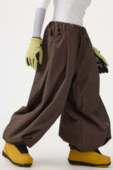Pantalones de nieve holgados con cordón negro para mujer 