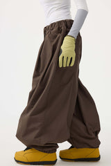 Pantalones de nieve holgados con cordón para mujer en color café 