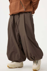 Pantalones de nieve holgados con cordón en color beige para hombre 